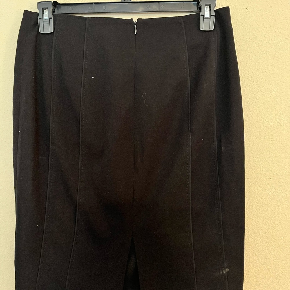 Black A line skirt.